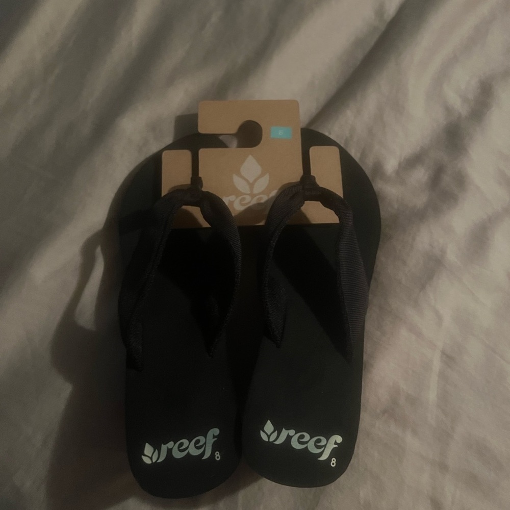 Reef Black Flip Flops